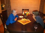 Eric is teaching me during my very first game of chess. He let me beat him, bless his heart.